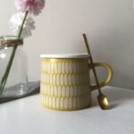 Yellow geometric pattern ceramic mug for coffee and tea